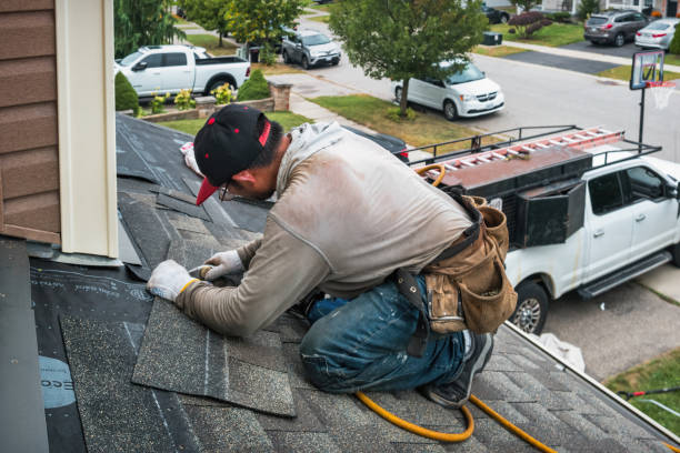 Professional Storm Damage Roof Repair technician working in Upland, IN